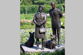 The new sculpture of Her Late Majesty Queen Elizabeth II stands adjacent to the statue of her late husband, Prince Philip. the Duke of Edinburgh in Antrim Castle Gardens. Picture: Stephen Davison / Pacemaker.