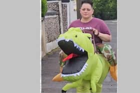 Ellie McDowell out practising in her dino costume ahead of Sunday's marathon. Picture: Ellie McDowell