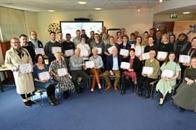 Councillor John Laverty BEM, Regeneration and Growth Chairman at LCCC with recent graduates