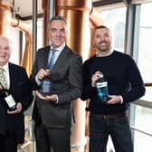 Belfast whiskey and gin distillery, Hinch Distillery has announced a partnership with local actor and producer, James Nesbitt.. Pictured are founder of Hinch Distillery, Dr Terry Cross OBE with his son, Patrick Cross, and James Nesbitt. Credit: Press Eye Ltd