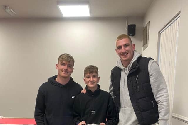 Junior Player of the Year, James Woodside, alongside Jake and Frank.