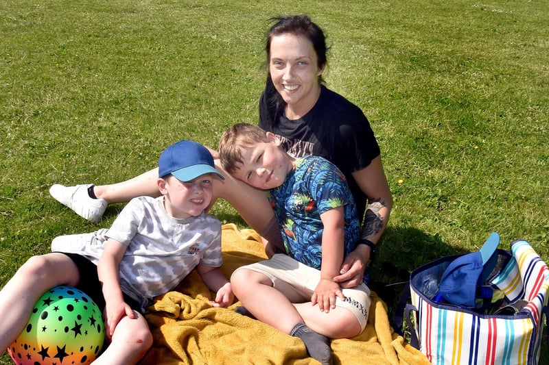 Hannah Robinson and sons, Michael and Ryley Stevenson enjoyed outdoor dining in Portadown People's Park during the great weather on Wednesday. PT22-249.