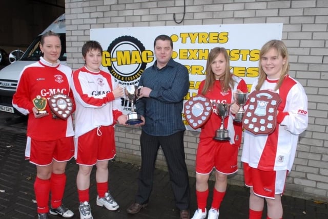 Gordon McKee of G-Mac pictured with prize winners from Larne Ladies Football Club in 2007. Included are (from left): Laura Colborn who won the Most Improved Player and an appearance award; Player of the Year Carys Lloyd; Carina Weekes who won the Players' Player of the Year and the Young Player of the Year trophies and Lauren McGucken who was the Supporters' Player of the Year and the Top Goalscorer.