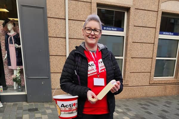 Breast cancer survivor Pamela Brady collecting in Lisburn. Pic credit: Action Cancer