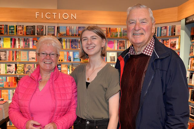 Manager of the new Waterstones store at Rushmere , Holly Alexander pictured with her grandparents Edith and Mervyn Alexander at the opening of the store on Friday morning. PT41-202.
