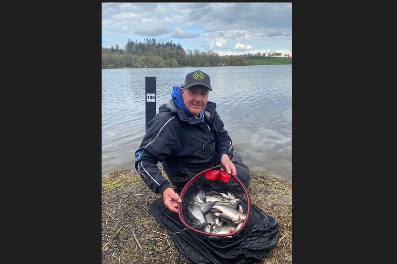 Philip Jackson, of Lurgan Coarse Angling Club, shows his winning catch as the team scoop the World Club Feeder Championship at Muckno, Castleblayney, Co Monaghan at the weekend.