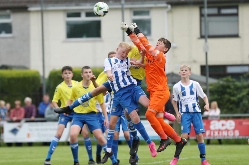 Coleraine goalkeeper Syzmon Bednarz dealing with  a cross during Tuesday's Boys Minor Group B match at Broughshane.