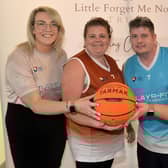 Pictured at the charity basketball tournament at South Lake Leisure Centre in Craigavon are Little Forget Me Nots charity workers, Louise Taylor, left,  charity founder, and Catherine Muldoon, right, community connections officer, with Lindsey and Paul McKenna who organised the event in memory of their baby daughter Darcy. LM42-200.