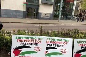 Workers Party placards carried at the march to the BBC displayed during the speeches outside the BBC headquarters  in Belfast.