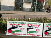 Workers Party placards carried at the march to the BBC displayed during the speeches outside the BBC headquarters  in Belfast.