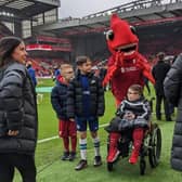 Dylan and the other mascots ahead of the match with Chelsea.