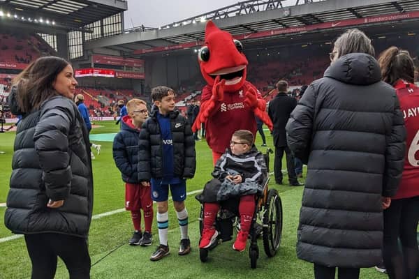 Dylan and the other mascots ahead of the match with Chelsea.