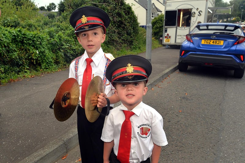 Brothers, Thomas (8) and Jacob Black (5) who are members of Mavemacullen Accordion Band pictured at the band's 70th anniversary parade in Markethill on Wednesday evening. PT32-223.