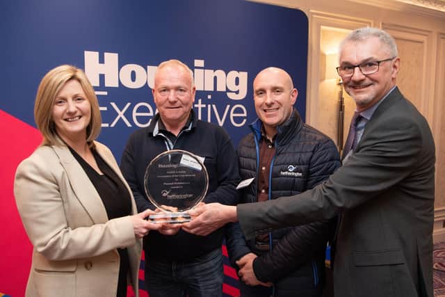 Pictured, from left, Grainia Long, the Housing Executive’s Chief Executive, presents winners Adrian Hetherington and Nicky Park, Hetherington Painting and Building Contracts, with their Health & Safety Contractor of the Year Award 2023 for Planned Maintenance along with Chris Welch, Chair of Asset Management Maintenance Committee.