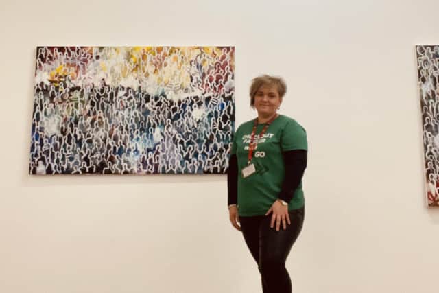 Robyn Haslett pictured with one of her pieces of work.