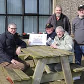Frankie Cunningham (back row, left), Caretaker of Dervock & District Community Association celebrates winning the Cleaner and Greener award in the Housing Executive Rural Community Awards. He is joined by (back row, right) Matthew Hagan, Chairperson for Dervock Youth network and committee member, Dervock & District Community Association and (front row, left to right) Eoin McKinney, Housing Executive Rural Unit, Joe Small (Jnr), Chairperson of Dervock & District Community Association and John Wilmot, Vice-Chairperson of Dervock & District Community Association. CREDIT NIHE