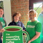 Diane Dodds MLA and Alderman Paul Greenfield with Philip and Jean Spratt, who have been hosting Macmillan Coffee Mornings for 24 years.