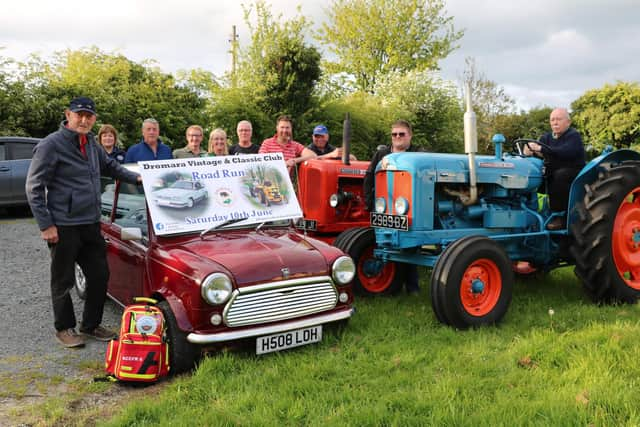 Dromara Vintage and Classic Club chairman Brian McGrillen (extreme left) at the launch of this year's vehicle road run with Club members and representatives of the designated  Charity the Slieve Croob Community First Responders (from left) Patricia Quinn (First Responders), Gerald McGrillen, George McNeill, Helen Madine (First Responders), Stanley Gratton, John Fitzpatrick, Davy Thompson, Stephen McCann and Peter McGrady.