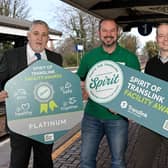 Pictured celebrating their achievement are Joe Hollyoak, Translink; Steve McCready (KNIB) and Chris Allen, Translink.  Photo: Translink