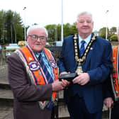 The Mayor of Causeway Coast and Glens, Councillor Steven Callaghan has hosted a civic reception to celebrate the hard work of a retiring Orangeman. Pictured are Wor Bro Andy McLean with the Mayor councillor Steven Callaghan and Andy’s brother Sammy McLean