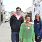At Point Street to see the completed public realm work are Eamon McMullan, capital regeneration manager; the Mayor of Mid and East Antrim, Alderman Gerardine Mulvenna; Gail Kelly, town centre development manager and Neil Richardson, deputy director of the DfC Regional Development Office.