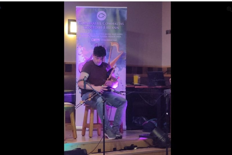 A young man plays the Uilleann Pipes and entertains the crowds at Culture Night in St Peter's GAC in Lurgan, part of the two week long County Armagh hosted this year by Lurgan.