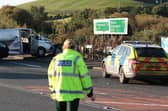 Police at the scene of the collision. Photo: Press Eye