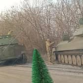 Driving past tanks on the way into Donetsk.