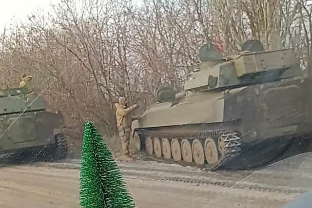 Driving past tanks on the way into Donetsk.