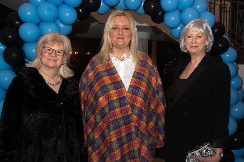 Smiling happily for the camera at the Portadown College 100th anniversary dinner are from left, Lorna Quin, Ruth Loney and Susan Mocsari. PT11-207.