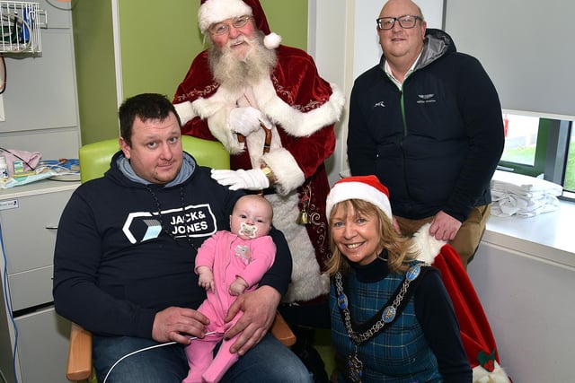 Craig Wylie and daughter Madison (5 weeks)  pictured with Santa, Lord Mayor of ABC Council, Alderman Margaret Tinsley and Councillor Peter Haire during the Mayoral visit to the Blossom Unit on Christmas Eve.