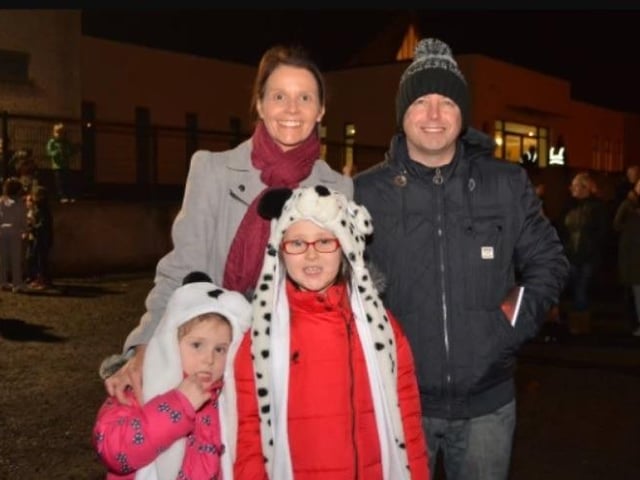 Sarah, Amber and Ellie Johnson with Dougie Perry at the Monkstown Christmas tree lights switch on in 2014.