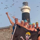 At Rockabill Lighthouse in Skerries, Co Dublin, six local women calling themselves The Grainne Ni Mhailles are pictured after they swam the 44 kilometre distance in the Irish Sea from Templetown Beach in Co Louth to the Lighthouse.