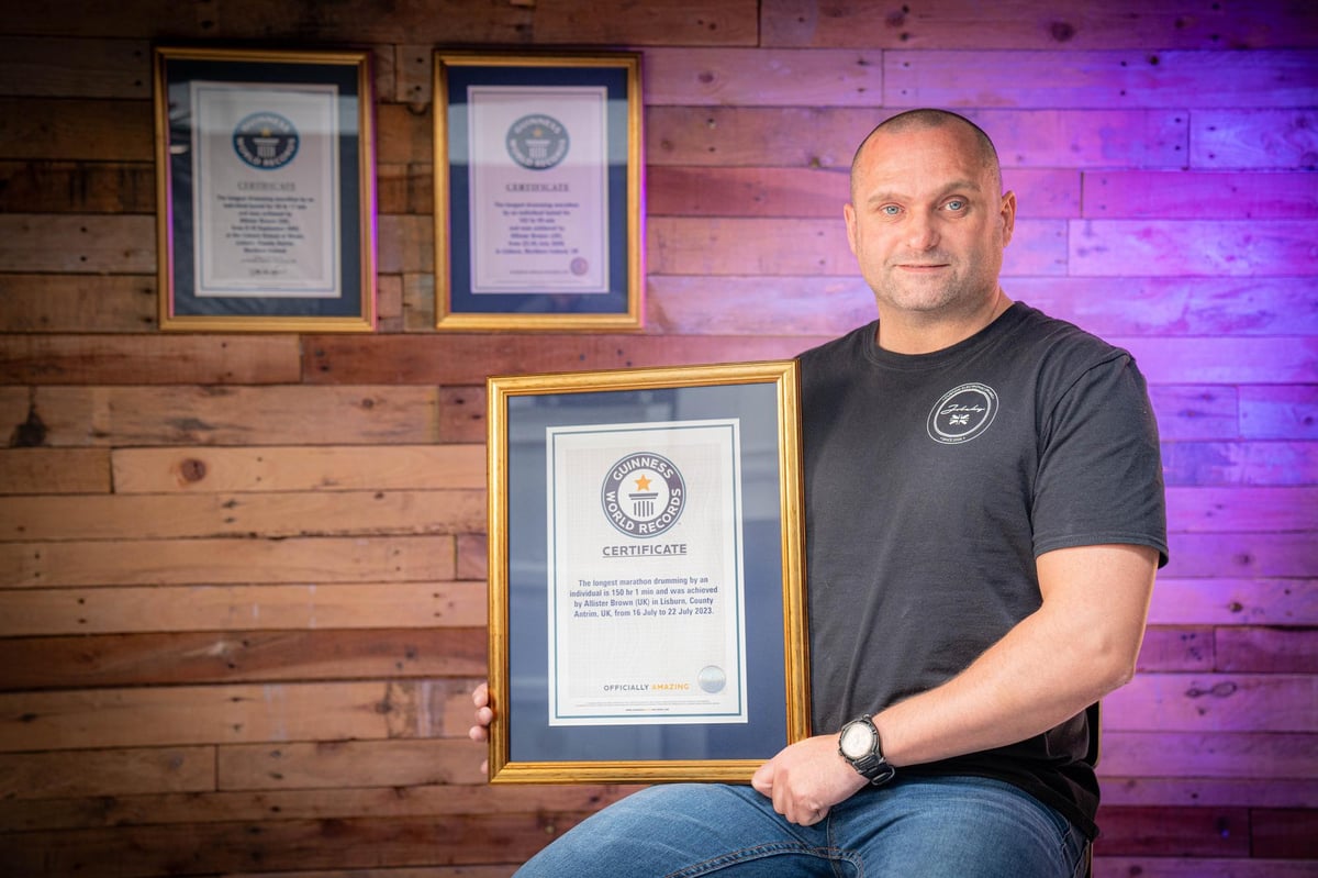 Official Guinness world record for Lisburn man Allister Brown's drumming marathon in memory of partner Sharon Deegan