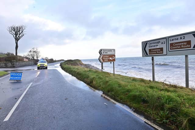 Police at the Antrim Coast Road on Friday. Picture: Colm Lenaghan / Pacemaker