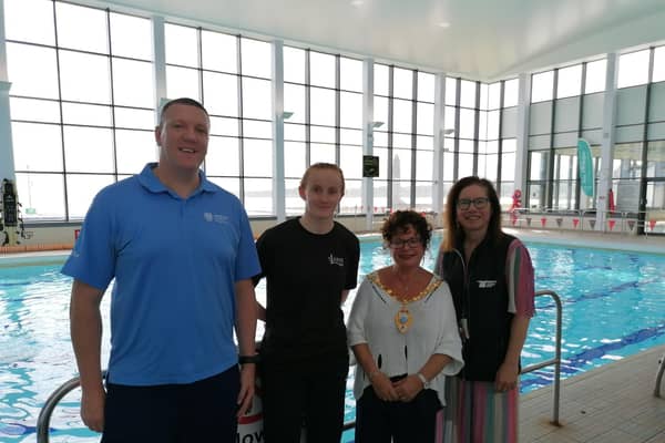 Danielle Hill pictured with Mayor of Mid and East Antrim, Ald Gerardine Mulvenna and representatives from Larne Leisure Centre and Woodsides Logistics. (Pic: NI World).