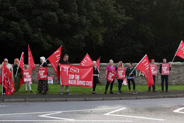 Health workers protest outside Antrim Area Hospital on Thursday morning. Picture: Stephen Davison / Pacemaker