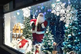 Christmas window display at The Key Charity Shop in Larne.
