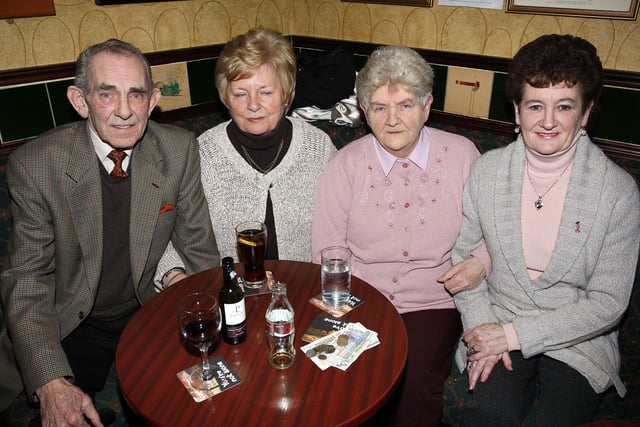 Enjoying the Macmillan Cancer Support Causeway Fundraising Group table quiz at the Railway Arms Bar, Coleraine, back in 2010 are John Templeton, Addie Young, Mollie Stirling, and Anne Templeton