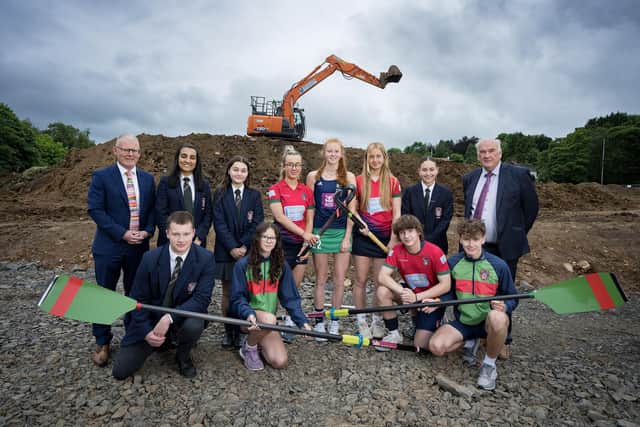 Dr David Carruthers, principal (left) and William Oliver, president of the board of governors, with pupils (back) Saashi Guy, Emma Patterson, Ellie Bucklee, Kia McCartney, Hope Ross, Martyna Satzan and (front) Thomas Brown, Brooke Reeves, George Campbell, Stevie Edgar. Submitted by Coleraine Grammar School