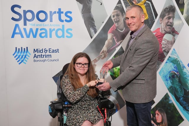 Damien McAlister from Pollock Lifts presents the Sportsperson or Team with a Disability award to Claire Taggart.