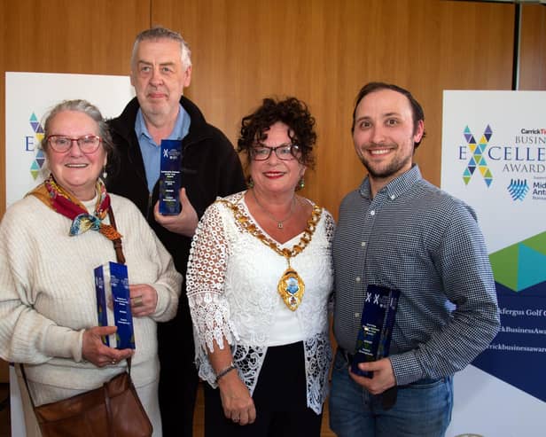 Carrick Greengrocers were the winners of three prizes at the Carrick Business Awards. Pictured with their trophies and Mayor, Geradine Mulvenna are (from left) Jane Robb, Adrian Scott and Ian Whyatt. CT17-212.  Photo: Tony Hendron