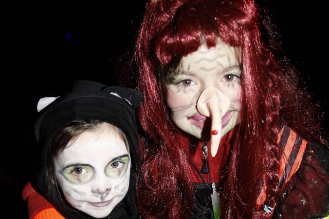 Amy-Jane and Sasha smile for the camera at the Halloween Party and Fireworks evening in Coleraine in 2009