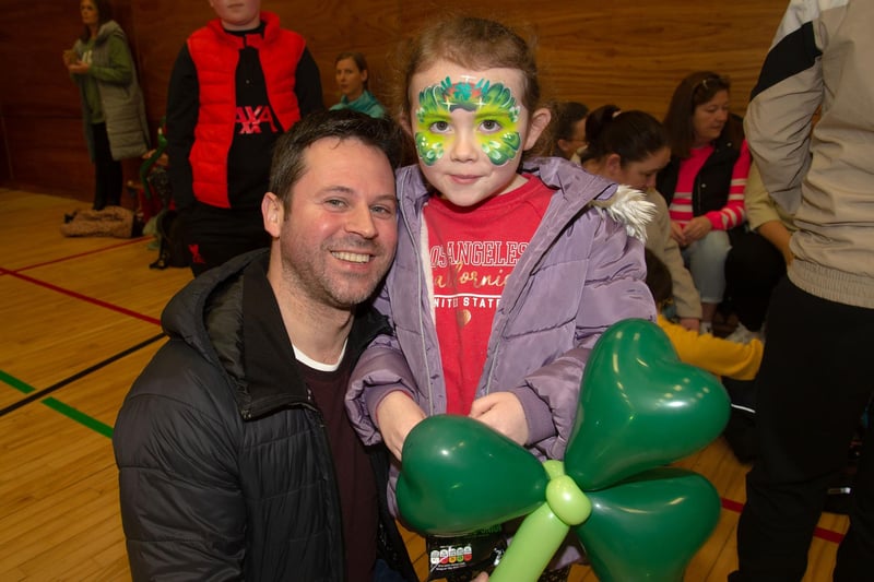 Carlos Duraes and daughter, Ellie-Grace McCann (6) looking happy at the St Patrick's fun day. PT11-234.