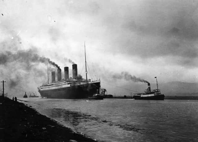 The RMS Titanic leaving Belfast to start her trials, being pulled by tugs, shortly before her disastrous maiden voyage of April 1912. (Photo by Topical Press Agency/Getty Images)