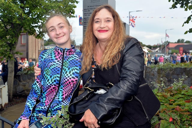Sharon Chambers and daughter Victoria had a front row seat for the mini 12th parade in Markethill. PT27-280.