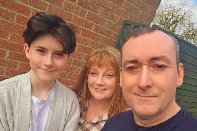 Simon Piper will be performing as Lumiere in Lisnagarvey Operatic's Beauty and the Beast, while his wife Wendy plays the Baker's Wife and his son Isaac is in the chorus. Pic credit: LODS