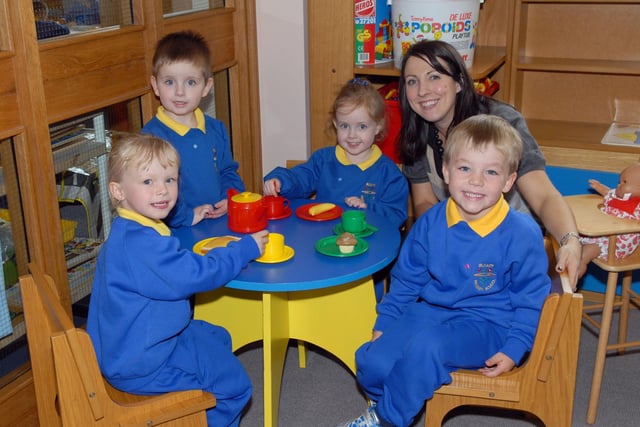 Bleary Primary School P1 teacher Mrs Cathy Law with new pupils Jessica Wheelan, Ben and Katie Hawthorne and Alex Wheelan back in 2007.