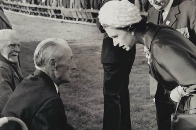 HM Queen Elizabeth II with John Gordon (Veteran of the Battle of the Somme) at the 50th Commemoration of the Battle of the Somme, King's Hall Balmoral, photographed by Pat in 1966.
