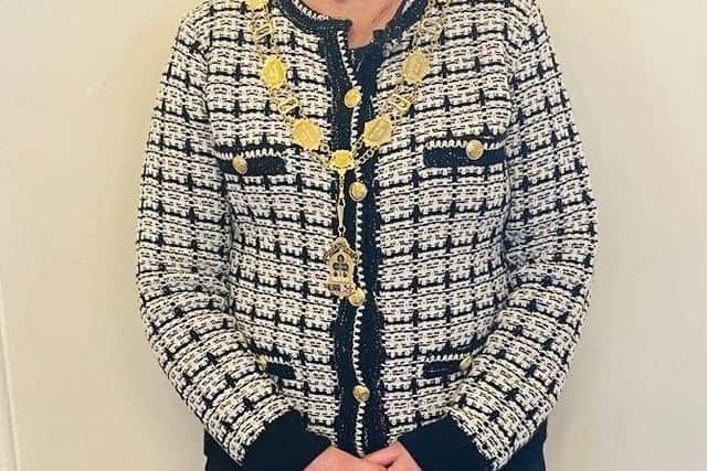 Lurgan bowler Angela Thompson proudly wearing her chain of office as IWBA President 2025